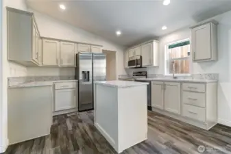 Custom kitchen w/ island.