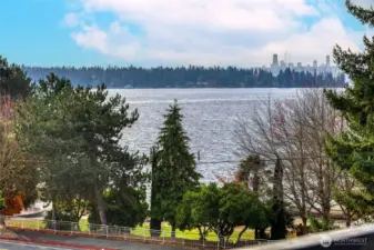 Gorgeous Views!  Enjoy Beautiful Sunsets, Seattle City Skyline and Lake Washington Views from your Top-Level, private deck!