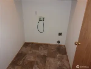 Separate Laundry Room.