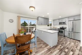 Dining nook with large slider out to the deck.
