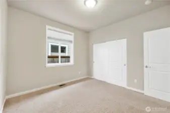 Well-proportioned bedroom #2 offers comfort and versatility