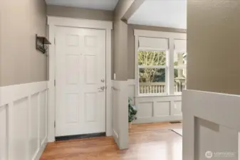 View of front door and entrance into office space.