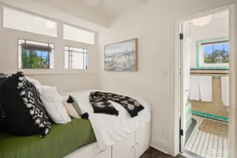 1 bedroom has lovely sleeping nook and built in closets.