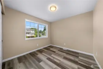 One of the 4 upstairs bedrooms.  All bedrooms and kitchen have USB ports in the outlets.