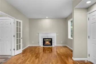 Other side of the living room showing the gas fireplace.