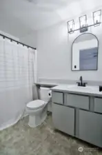 Primary full bathroom - notice the modern, black fixtures