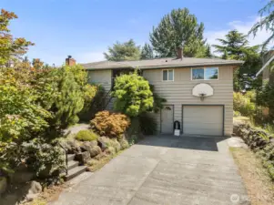 Welcome Home to this spacious and well-cared for home with lots of room and privacy. Plenty of parking too and a basketball hoop for neighborhood pickup games.
