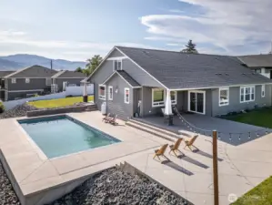New in-ground pool and upgraded mechanical secure cover and expanded concrete pool surround space