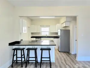 Kitchen w/eating space and SS Appliances.
