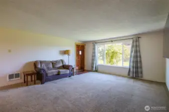 Living room facing entry.