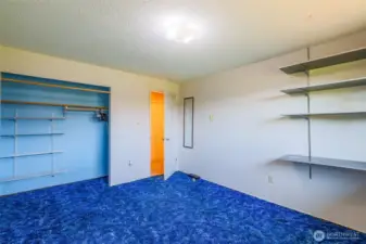 Bedroom once doubled as a craft room.