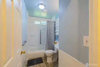Full bathroom with grab bars.
