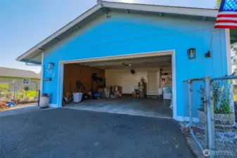 Large garage with kitchen entry.