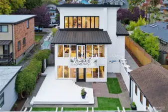 natural light pours in through dramatic south facing windows