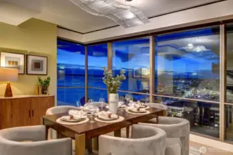 Twilight photo of dining room area in Unit 1206