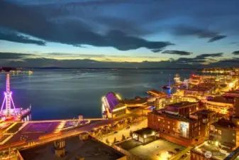 The Waterfront District and Great Wheel light up the night from the Unit 1206 deck