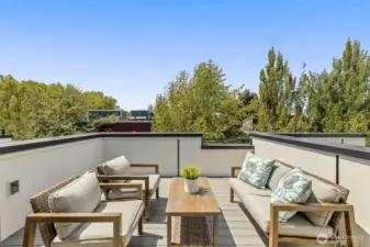 Outdoor lounge ready for entertaining, just steps from the Madrona retail corridor.