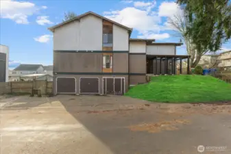 Three secure garages with additional parking for up to 5 cars. Grass is virtual