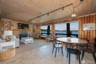 Living room / dining area with wall of windows for amazing views!
