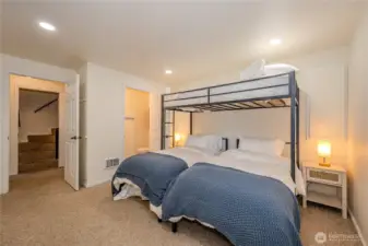 Lower level bedroom with 1/2 bath ensuite.