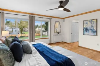 Primary suite overlooking the beautiful backyard