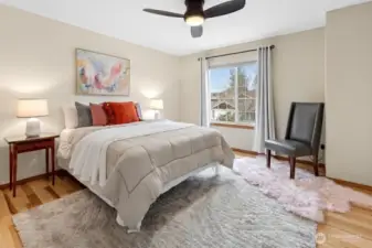 Bedroom 2 with engineered hardwoods.