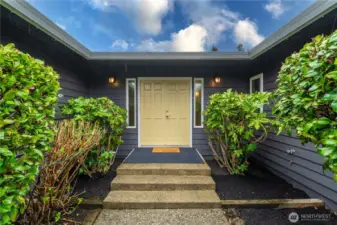 Make your way to the bright double doors to your new home!