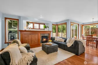Another view of the living room looking towards the smaller eating area.  There's a slider to the patio just beside the eating space.