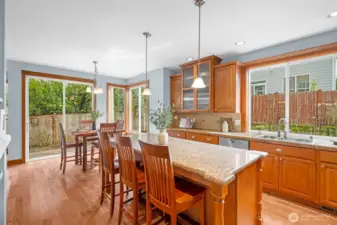 View from kitchen towards the informal eating area.  There is a slider door to the patio and backyard.
