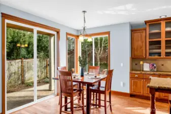 Light filled eating space is just next to the kitchen