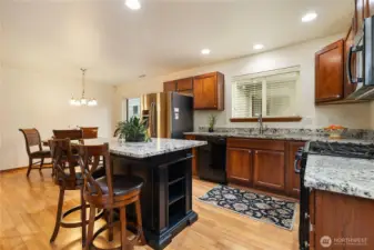 Kitchen with island and beautiful granite countertops