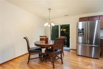 Sliding glass doors lead to the backyard & patio.