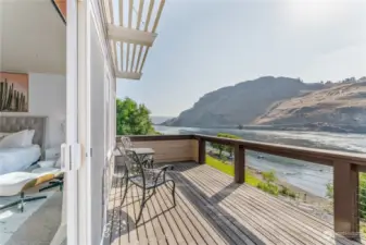 View 3 of upper level Primary Bedroom 1 w/ waterfront view deck overlooking the Columbia River.