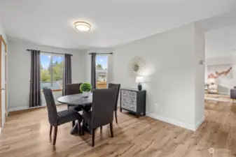 Spacious dining room overlooks side yard. Living and dining rooms could be reversed. A thought with your personal end use in mind.