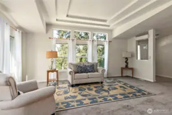 Formal living room overlooking your expansive backyard.