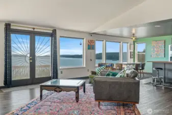 Living room/great room access to deck, and view