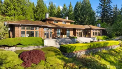 Daytime view of the back of the house. House and Landscape make a perfect match!
