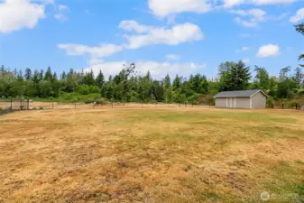 The inside yard of the main house and huge outbuilding.