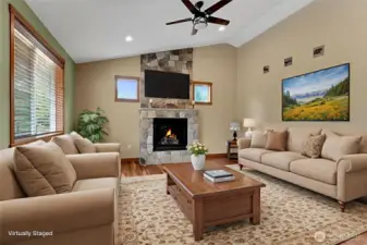 The living room is cozy yet nice sized. This is one example of what this room could look like with you in it!