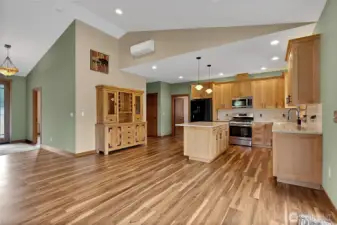 Vaulted ceiling, a nice sized kitchen with granite counters and gleaming floors. Beautiful
