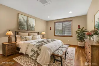 The primary bedroom is very nice sized. This is just one look for this room. So much potential
