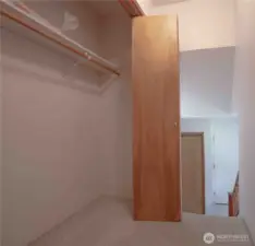 Hallway entrance closet for coats and more.