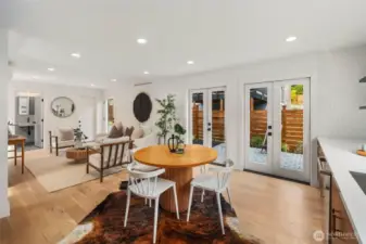 East facing double french doors make breakfast mornings a welcome treat.