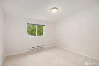 Primary bedroom with custom black out shade