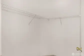 Walk in master suite closet