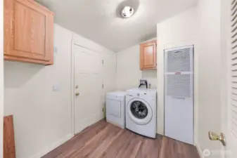 utility room has a back deck access