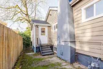 Side-door entry to kitchen from backyard.