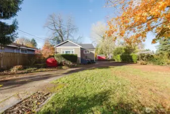 Tree on left side of driveway has since been removed, allowing even more morning sunshine.
