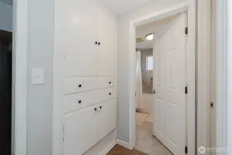 Built-in storage next to main level bathroom