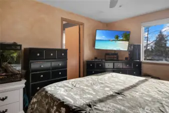 Primary suite offers attached full bath.